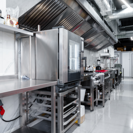Modern industrial kitchen layout with stainless steel equipment